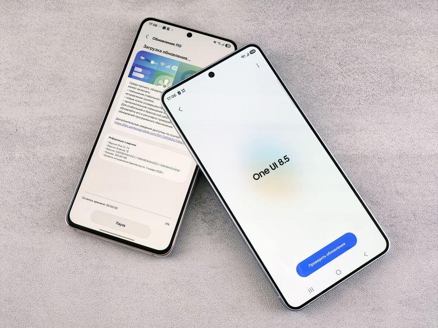 Two smartphones are shown displaying a software update screen with One UI 8.5.
