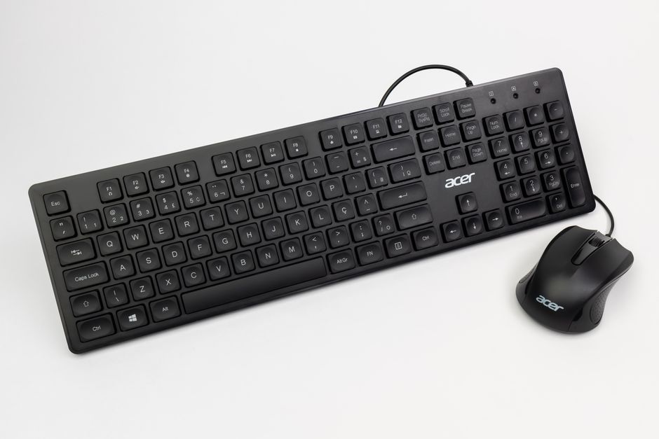 Black Acer keyboard and mouse set on a white background, perfect for tech stock shots.